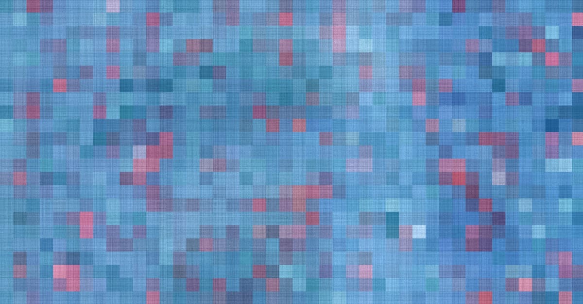 A vivid abstract pattern with vibrant blue and pink pixelated textures.